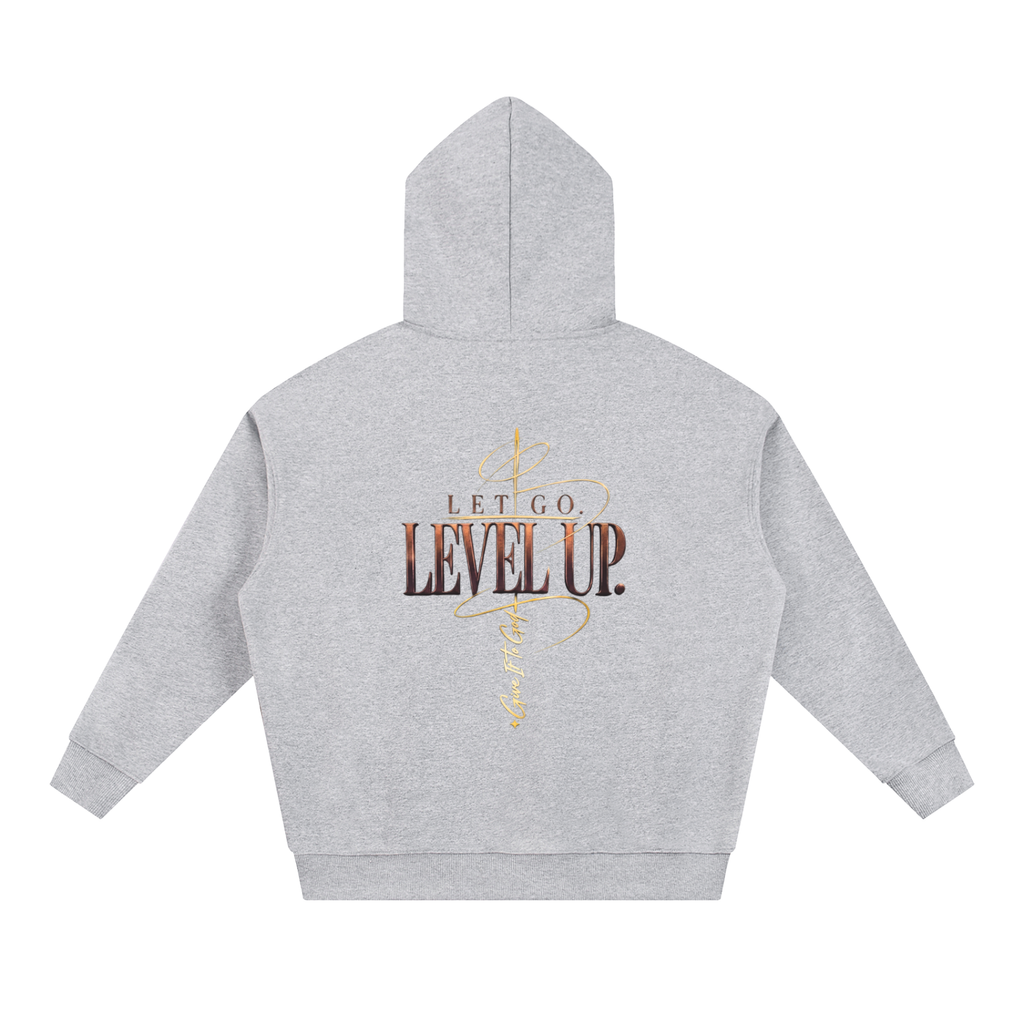 Back view of a Give It To God grey oversized heavyweight cotton hoodie with metallic gold Let Go Level Up graphic.